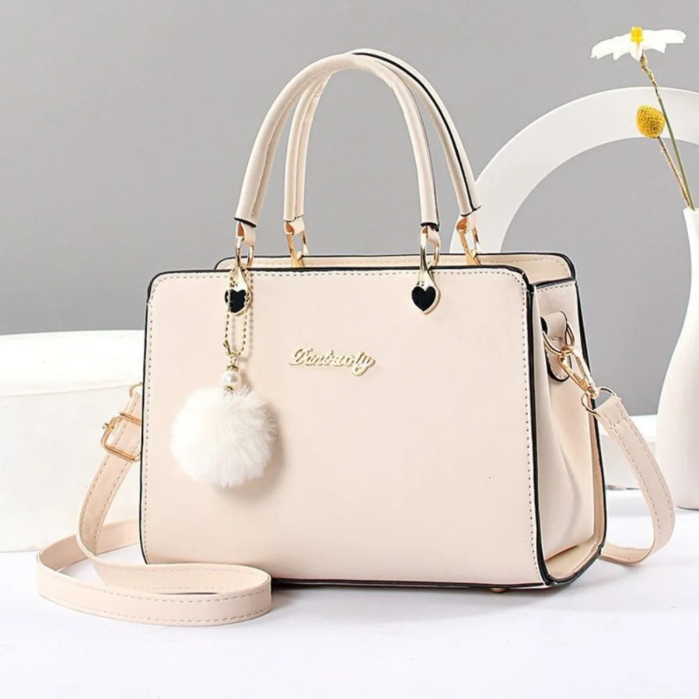 Modieuze dames handtas met hangerdetail