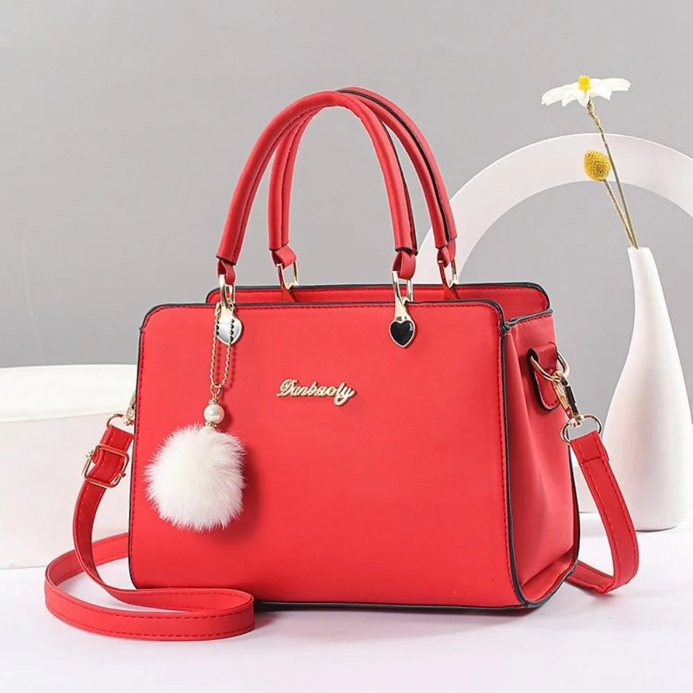 Modieuze dames handtas met hangerdetail