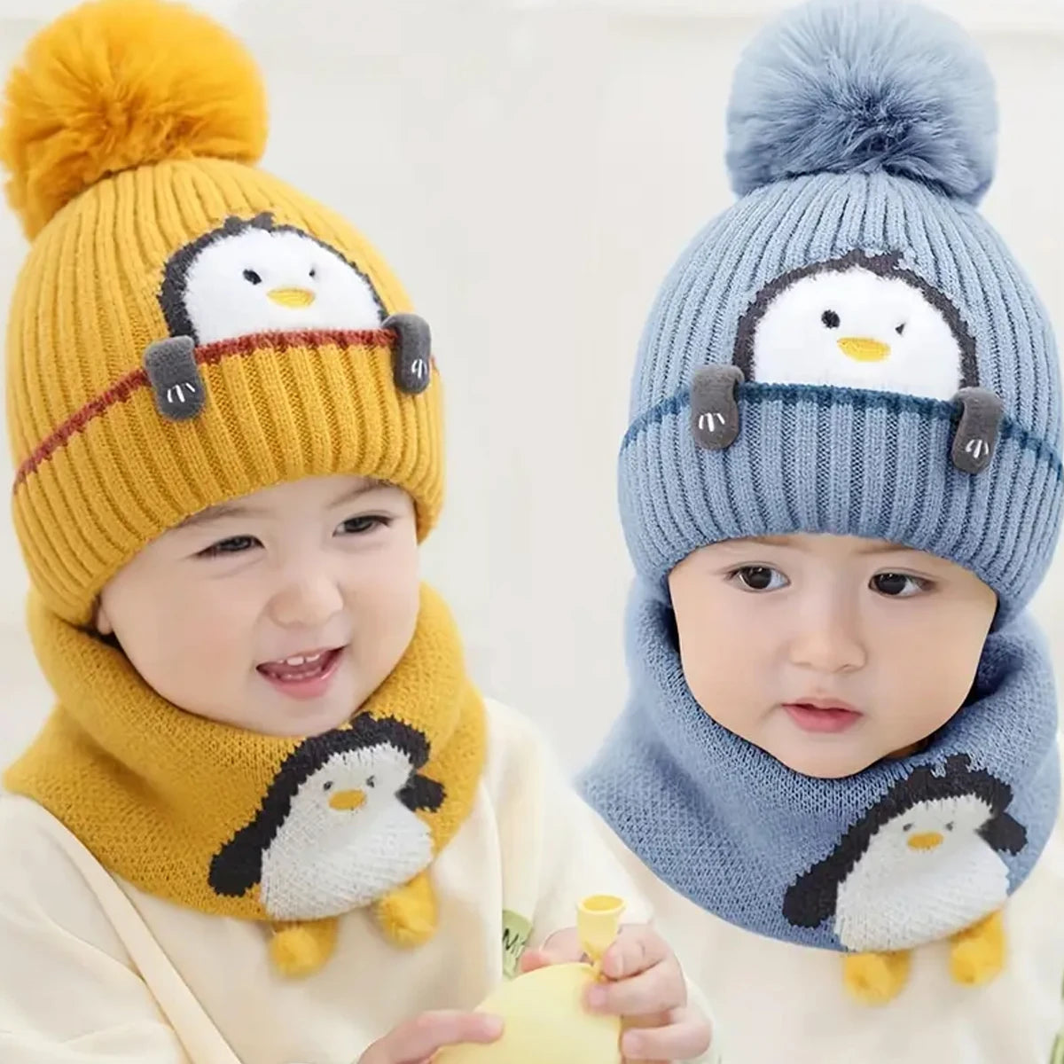 Kindermuts en sjaal met pinguïn