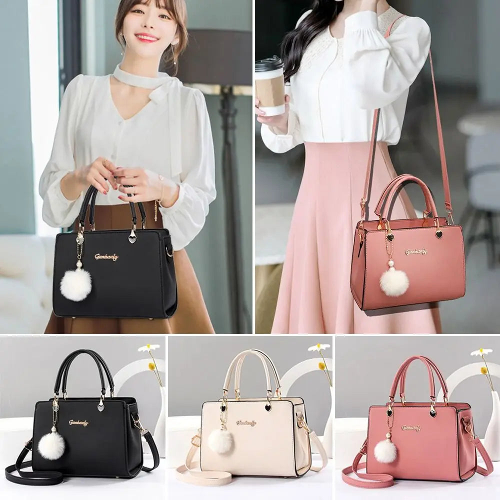 Modieuze dames handtas met hangerdetail