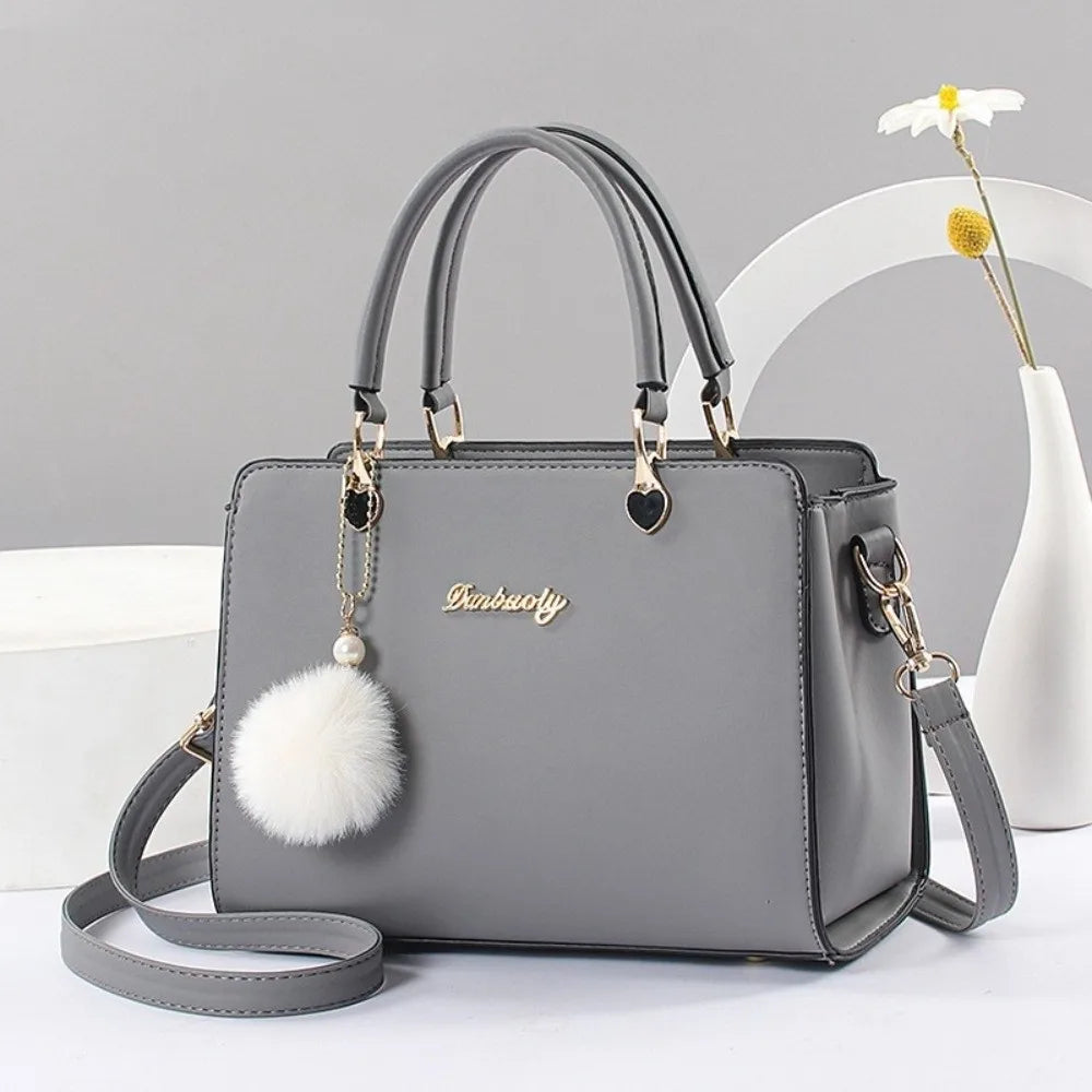 Modieuze dames handtas met hangerdetail