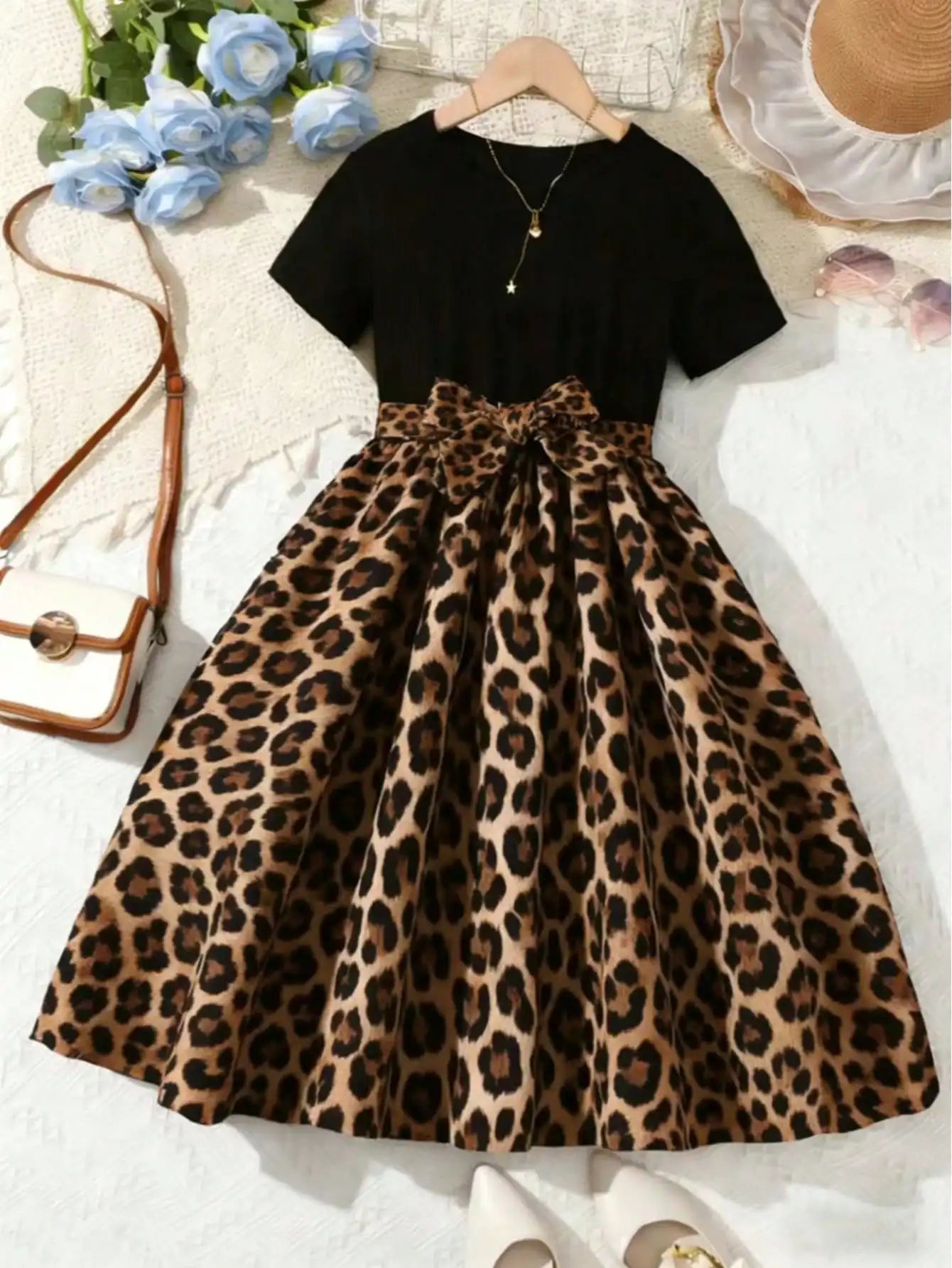 Zomerjurk met print en speelse vlindermouwen