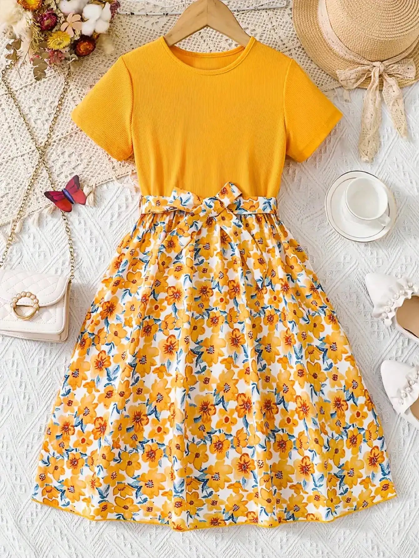 Zomerjurk met print en speelse vlindermouwen