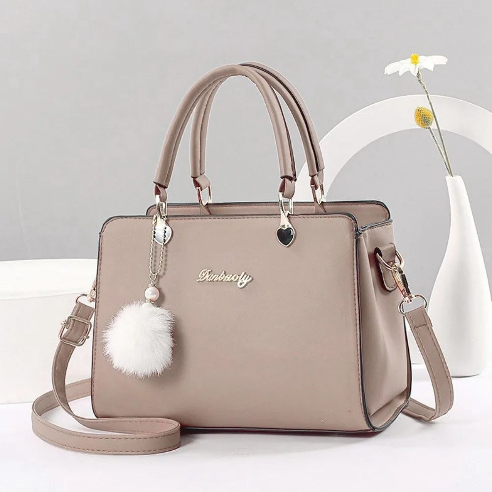 Modieuze dames handtas met hangerdetail