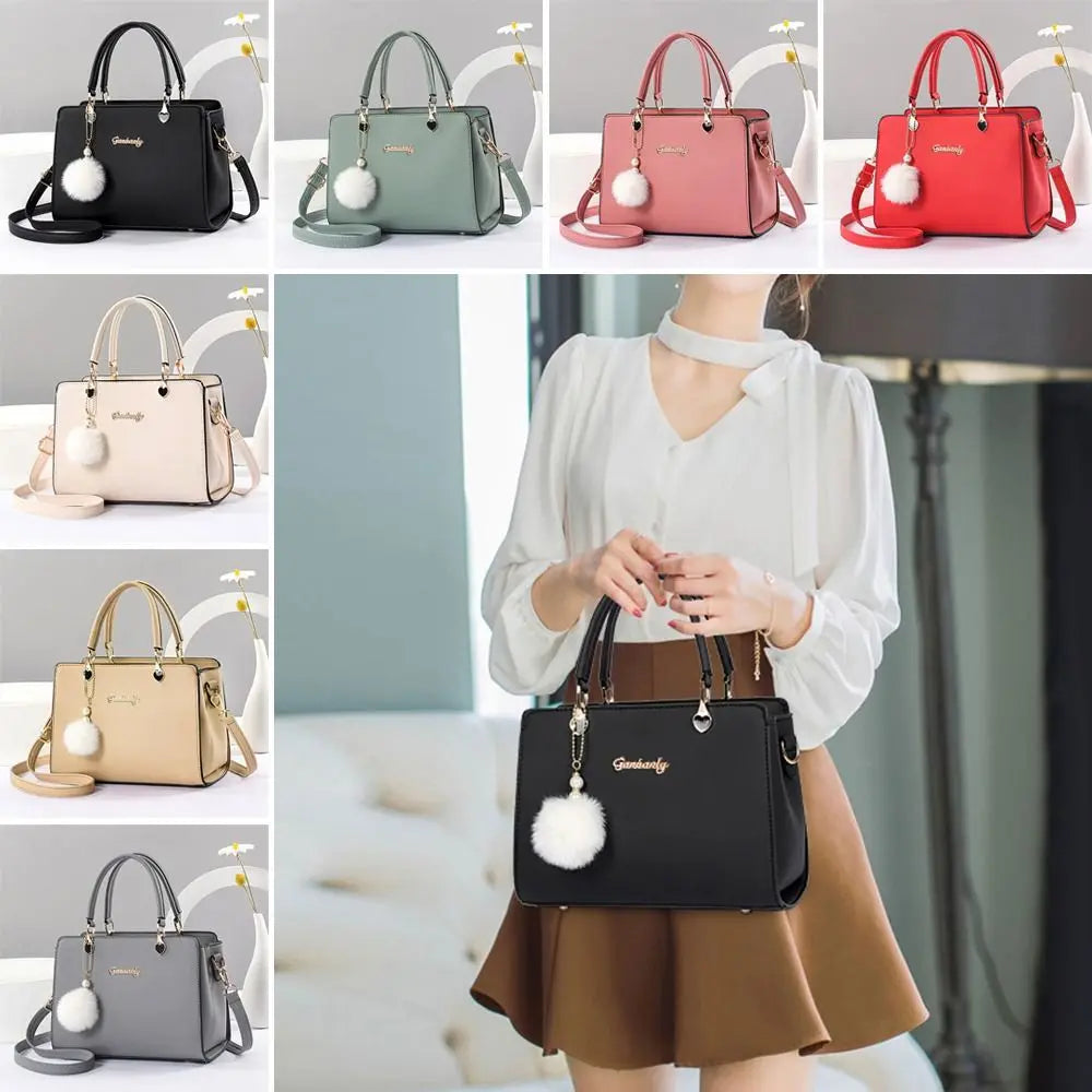 Modieuze dames handtas met hangerdetail