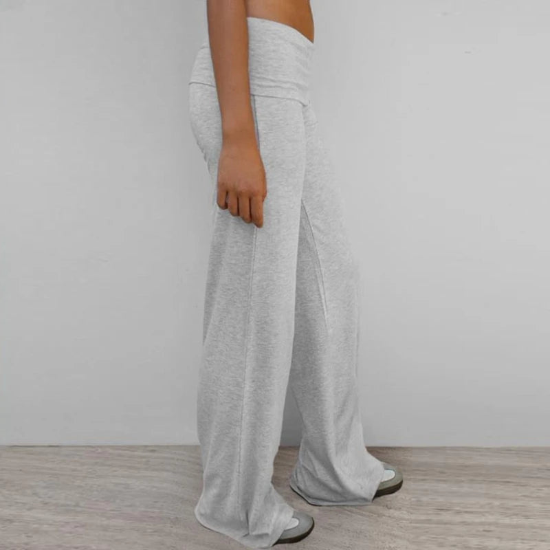 Dames flared yoga leggings met borduurdetail en fold-over tailleband