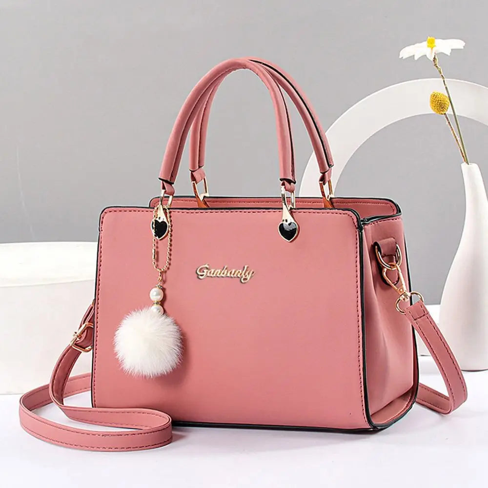 Modieuze dames handtas met hangerdetail