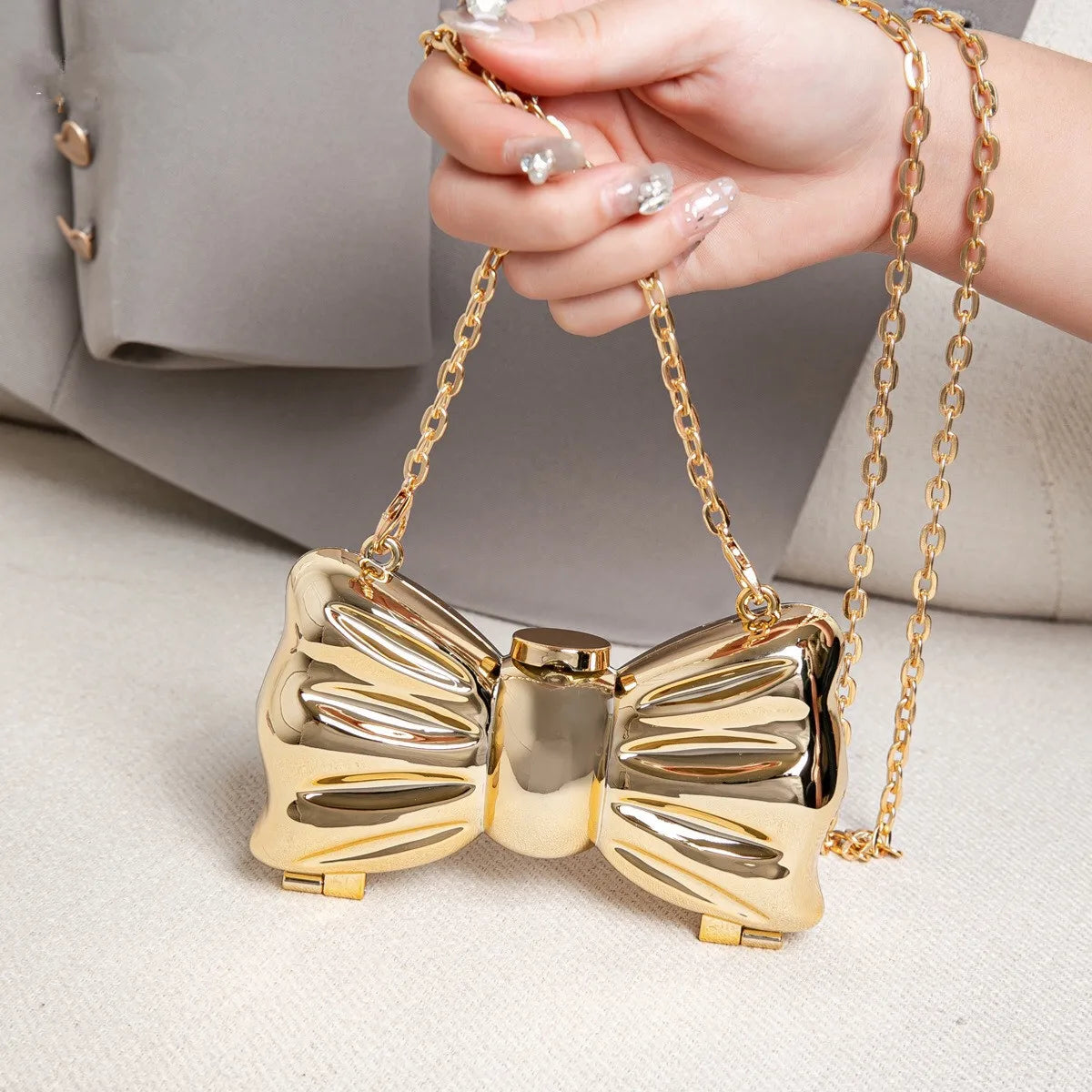 Metallic clutch in strikvorm - afbeelding 15