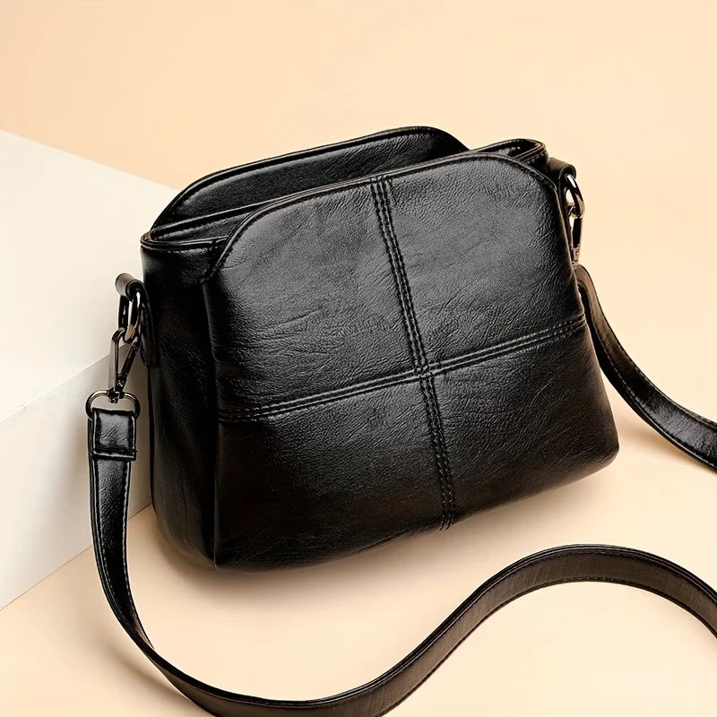 Compacte crossbody tas