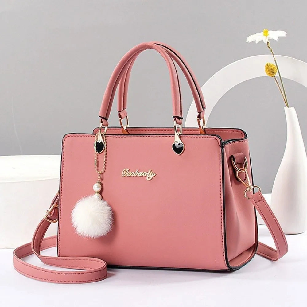 Modieuze dames handtas met hangerdetail
